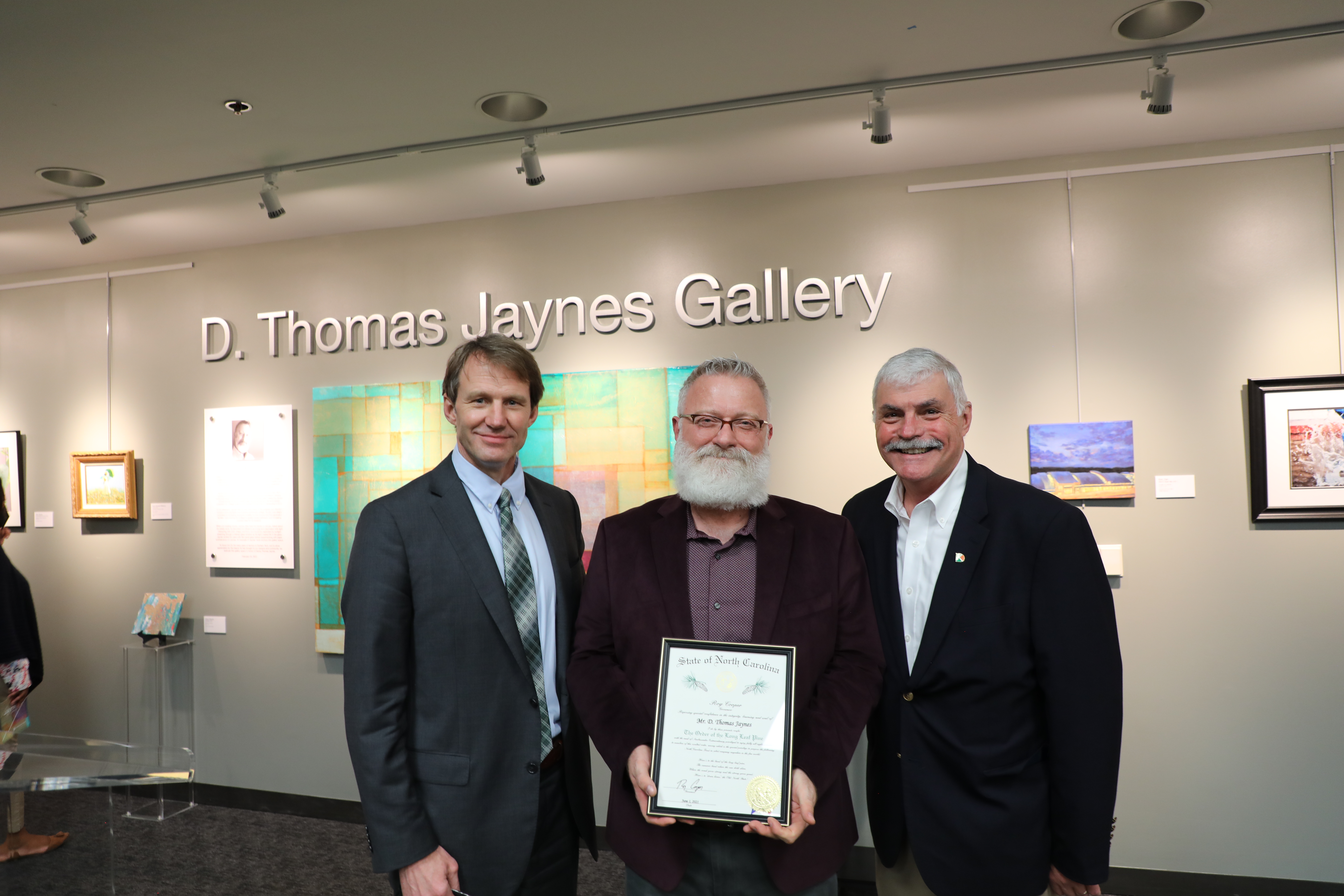 Tom receiving his reward