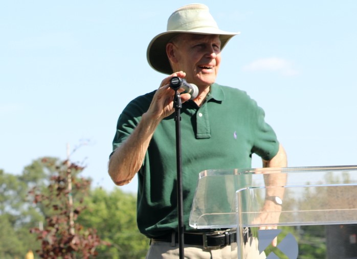 artist Guy Solie speaks on microphone