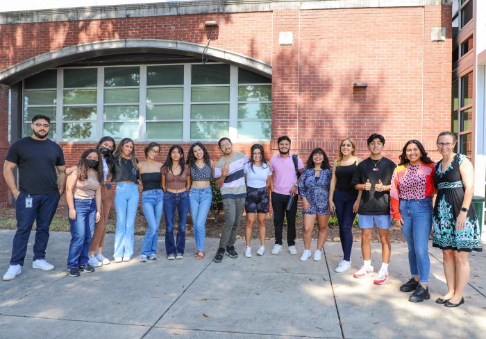 group of people smiling at camera