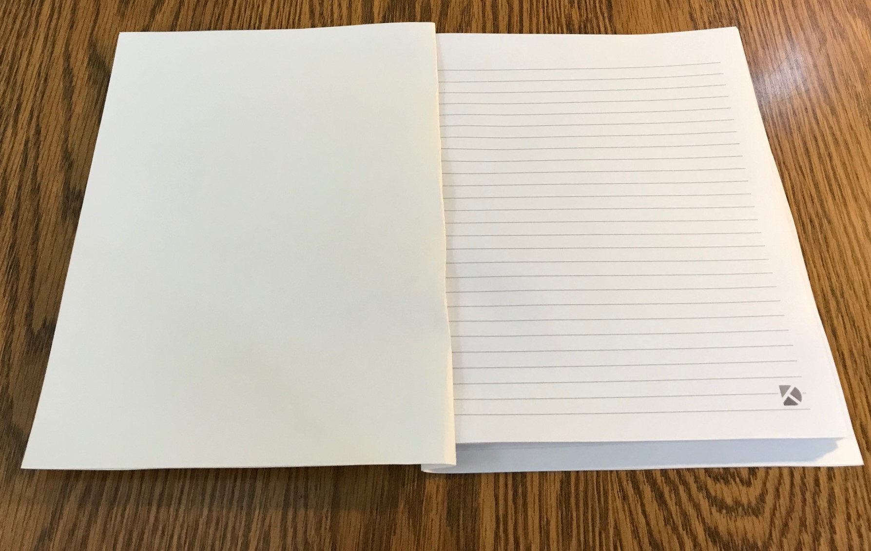 the cover folded back to create a spine 