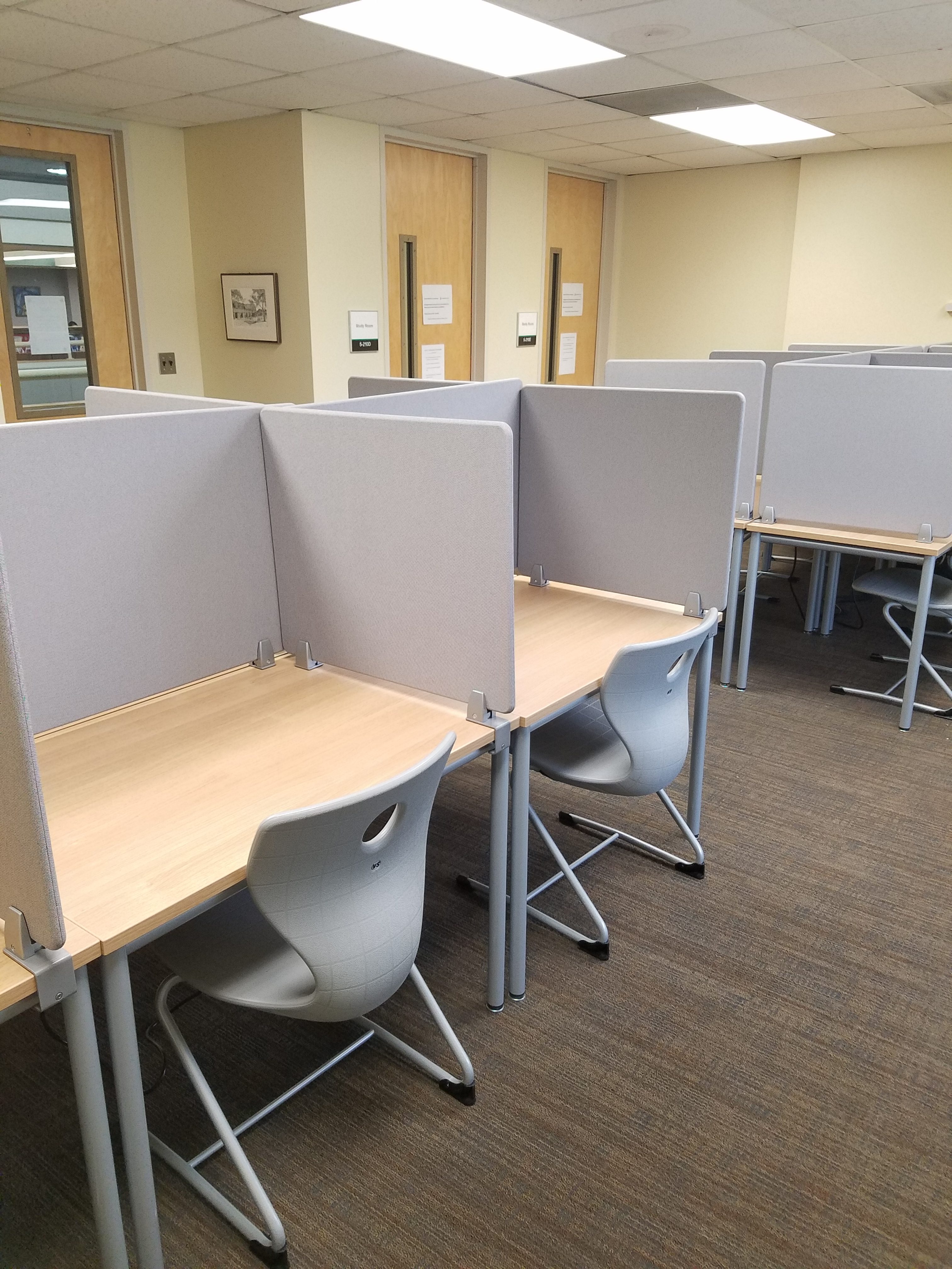 padded study carrel with chair