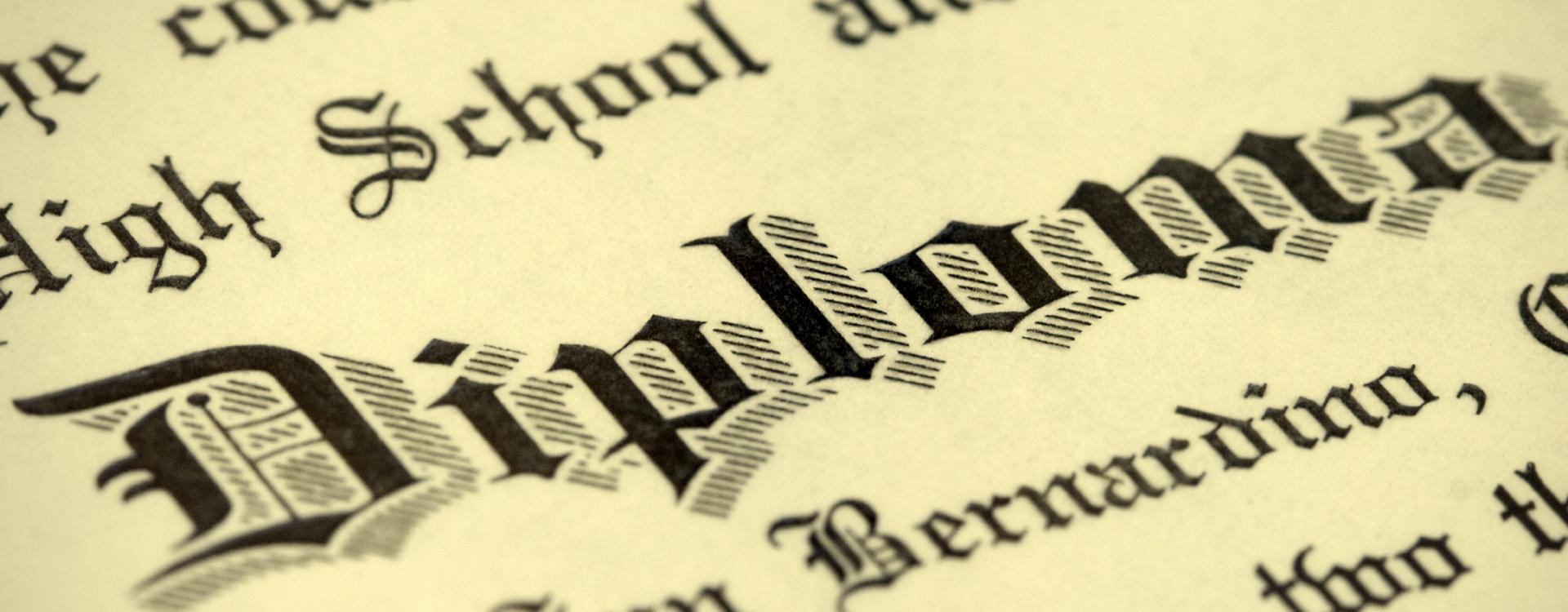 close up of the text diploma