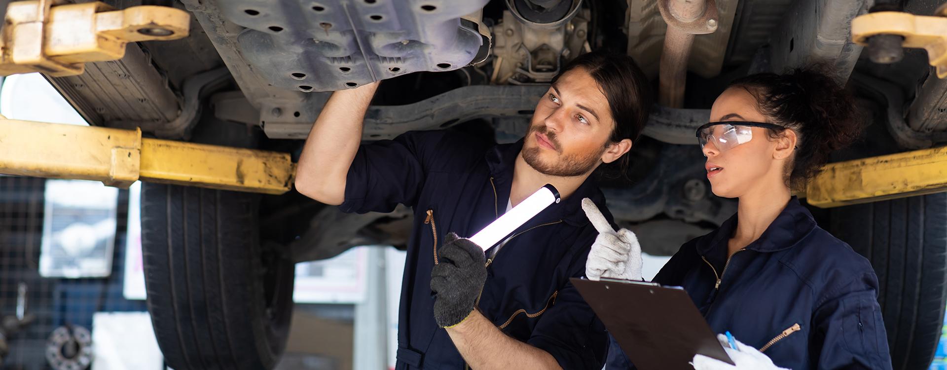 female student learned about auto undercar care from an employee