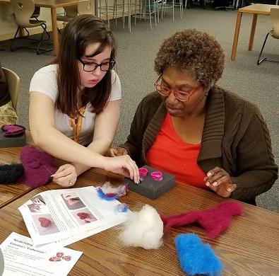 Students doing wool felting