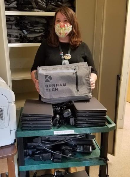 Librarian Meredith Lewis with new loaner Dell Chromebooks