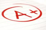 Photo of a red grade, "A+", circled on a paper
