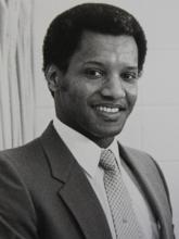 A young Phail Wynn Jr. smiling.