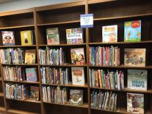 Books shelves with really cute picture books.