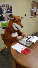 poetry fox at typewriter in main campus library