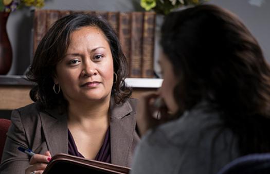 counselor listening to a patient