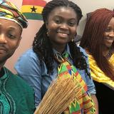 smiling EAP students, some dressed in traditional outfits