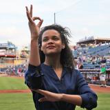 student signs the national anthem at a sporting event