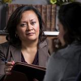 counselor listening to a patient