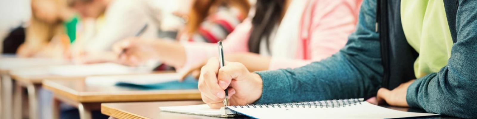 students taking notes in class